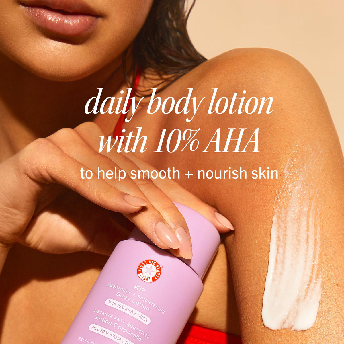First Aid Beauty pump dispensing lotion demonstrating easy one-handed application