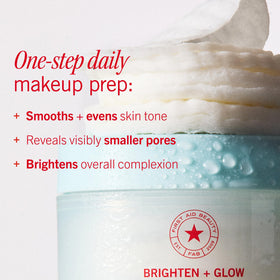 First Aid Beauty pad held in hand to show size and easy single-step use