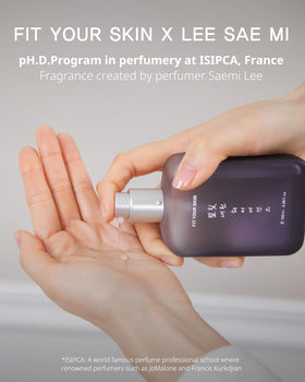 FIT YOUR SKIN applying serum to damp hair before styling for heat protection and manageability