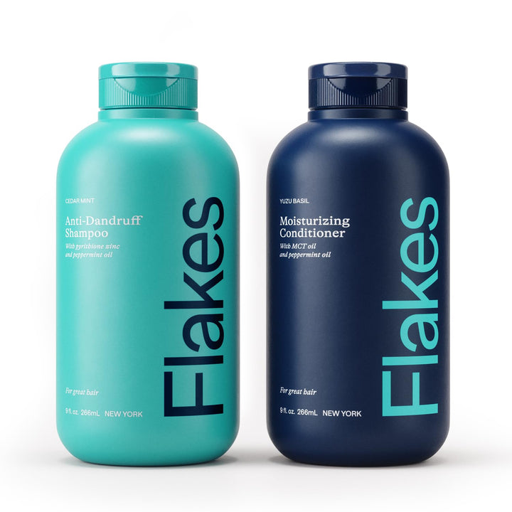 Flakes front packaging set showing bottles and cedar fragrance benefit