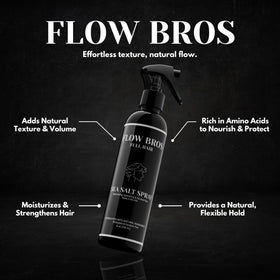 Flow Bros 8oz bottle beside hand for scale, showing convenient travel-friendly size