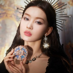 Flower Knows brush applying highlighter demonstrating precise, blendable coverage