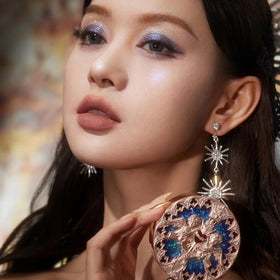 Flower Knows highlighter applied to cheekbone adding defined celestial glow