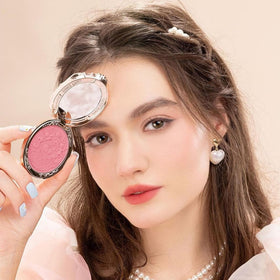 Flower Knows blush swatches on skin demonstrating buildable color