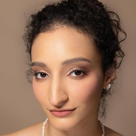 Flower Knows blush applied with brush on cheek demonstrating smooth blend benefit