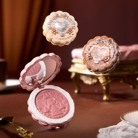Flower Knows embossed compact detail emphasizing charming biscuit-inspired design