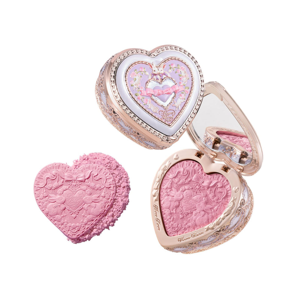 Flower Knows compact front view showing ornate embossed design and gift appeal
