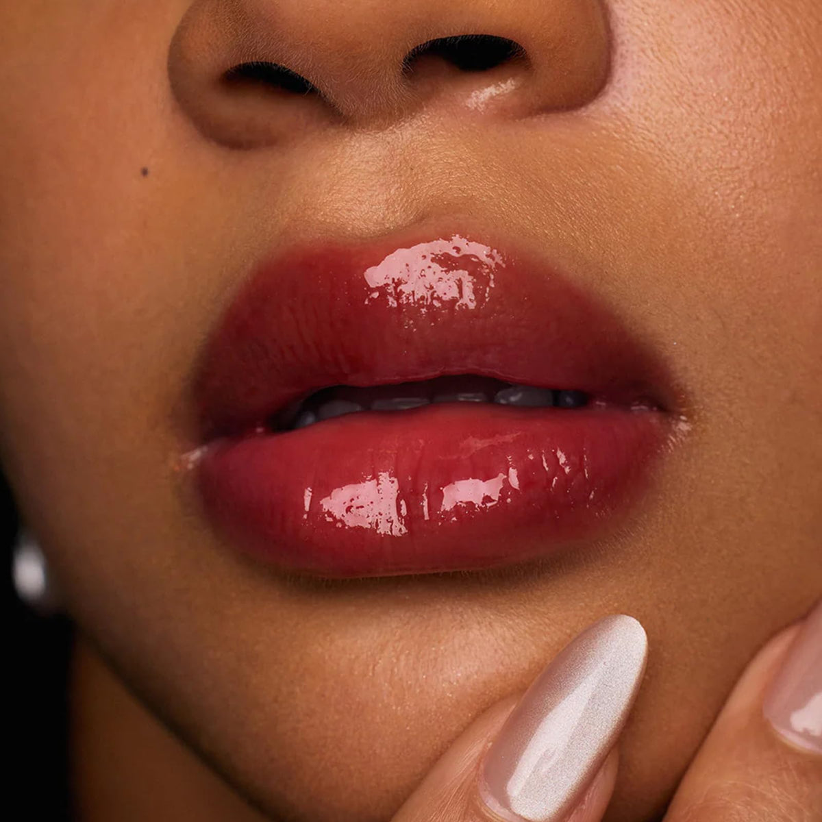 Flower Knows botanical ingredients display including squalane and meadowfoam seed oil nourishing lips