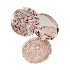 Flower Knows compact front view showing rose gold glow and elegant design benefit radiance