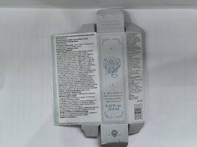 Flower Knows open cap with applicator resting showing clean design and precise delivery