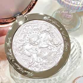 Flower Knows open compact revealing holographic pan and intricate embossing