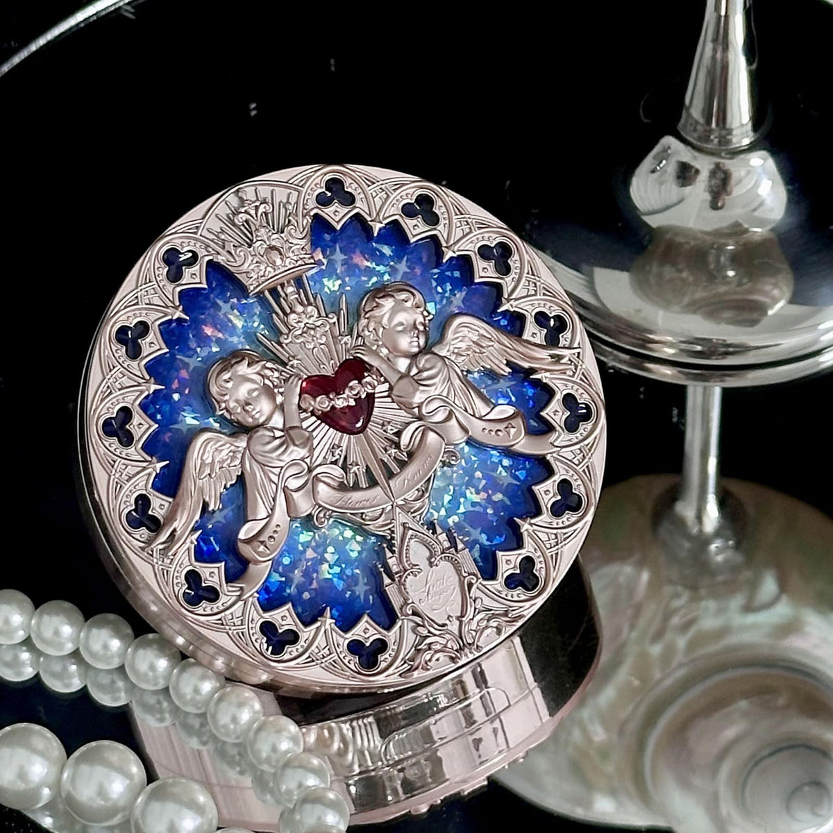 Flower Knows outer box artwork inspired by stained glass and ethereal light