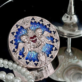 Flower Knows outer box artwork inspired by stained glass and ethereal light