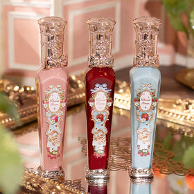 Flower Knows product on a vanity styled with roses to show gift-ready presentation