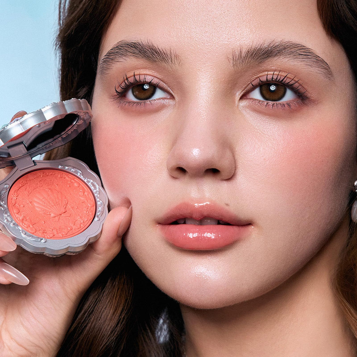 Flower Knows blush being applied with brush for easy blendable color