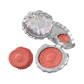 Flower Knows front compact showing seashell design and pretty vanity display