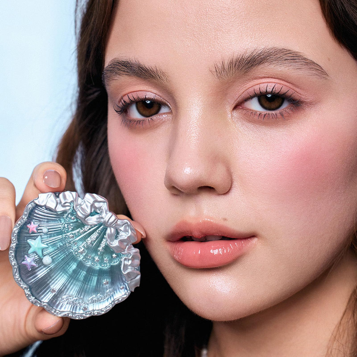 Flower Knows powder on brush showing buildable payoff and blendability