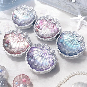 Flower Knows packaging detail with holographic seashell finish and elegance