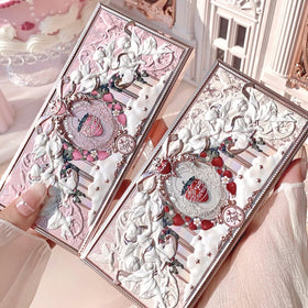 Flower Knows palette held in hand to show compact size and portability