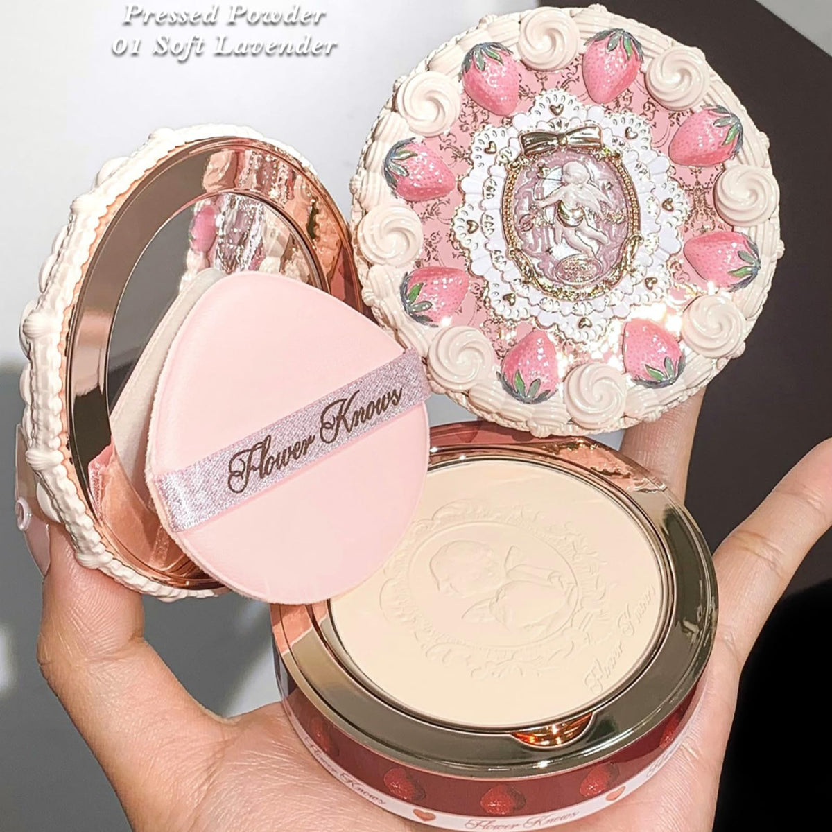 Flower Knows compact in purse conveying on-the-go convenience and style