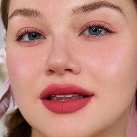 Flower Knows model wearing lipstick in daylight showing flattering bright pink
