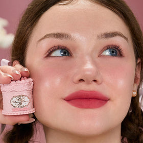 Flower Knows product beside coin showing compact size and travel-friendly benefit