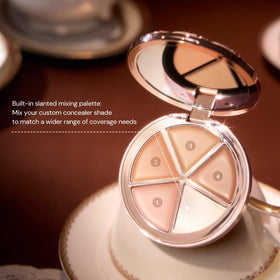 Flower Knows applying peach shade under eye to neutralize dark circles effectively