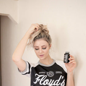 Floyd's 99 in hair being styled to show natural texture gain