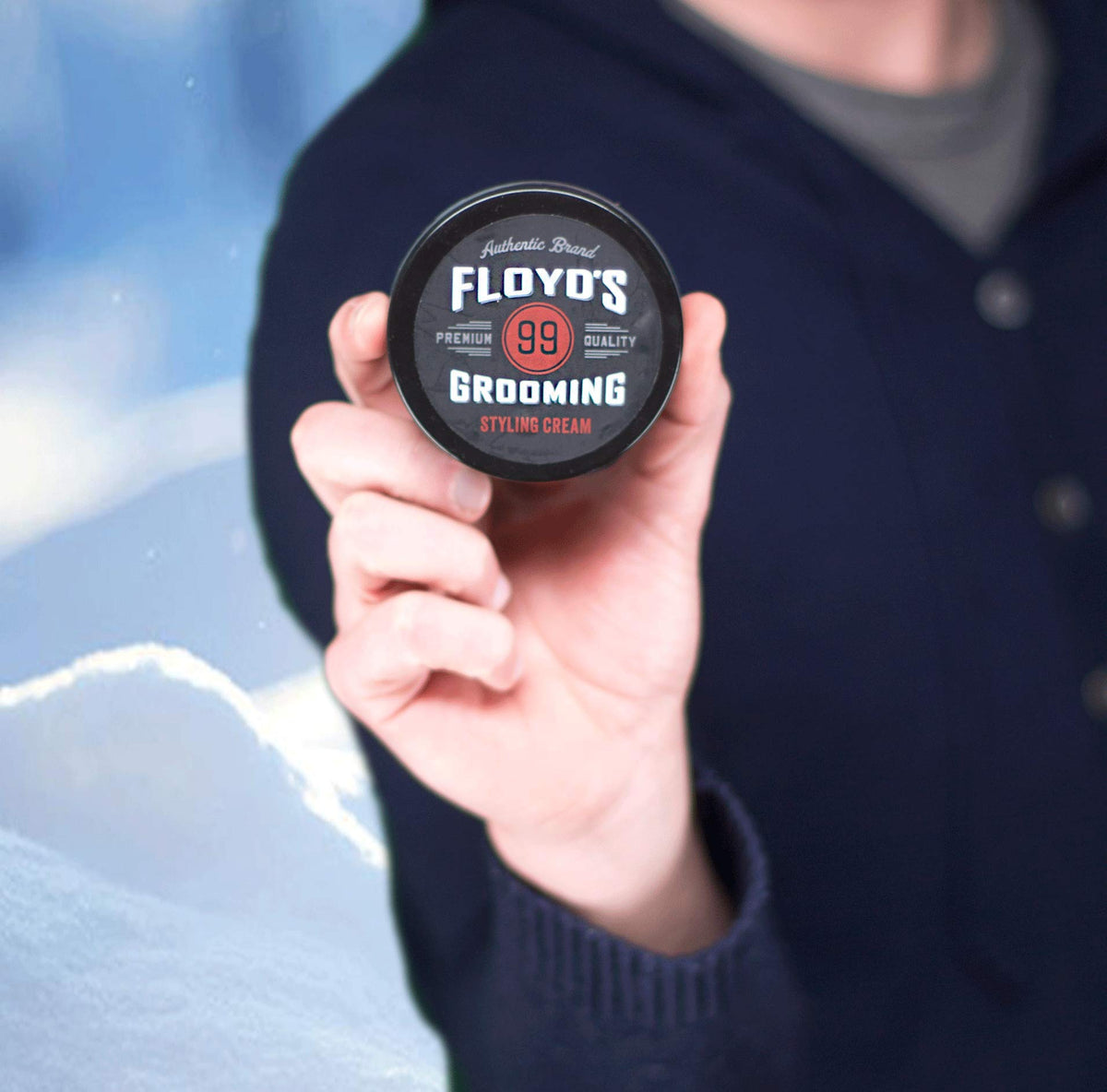 Floyd's 99 cream worked into damp hair for soft hold and natural texture