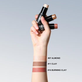 FOCALLURE bronzer stick applied to cheek to show natural sculpting benefit