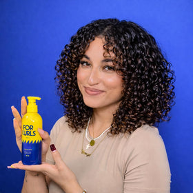 FOR HAIR curl cream on bathroom shelf in lifestyle setting