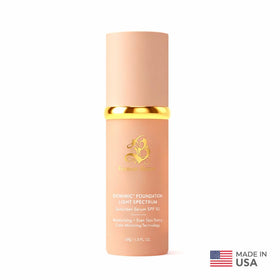Forever Bloom bottle next to a coin showing compact travel-friendly benefit