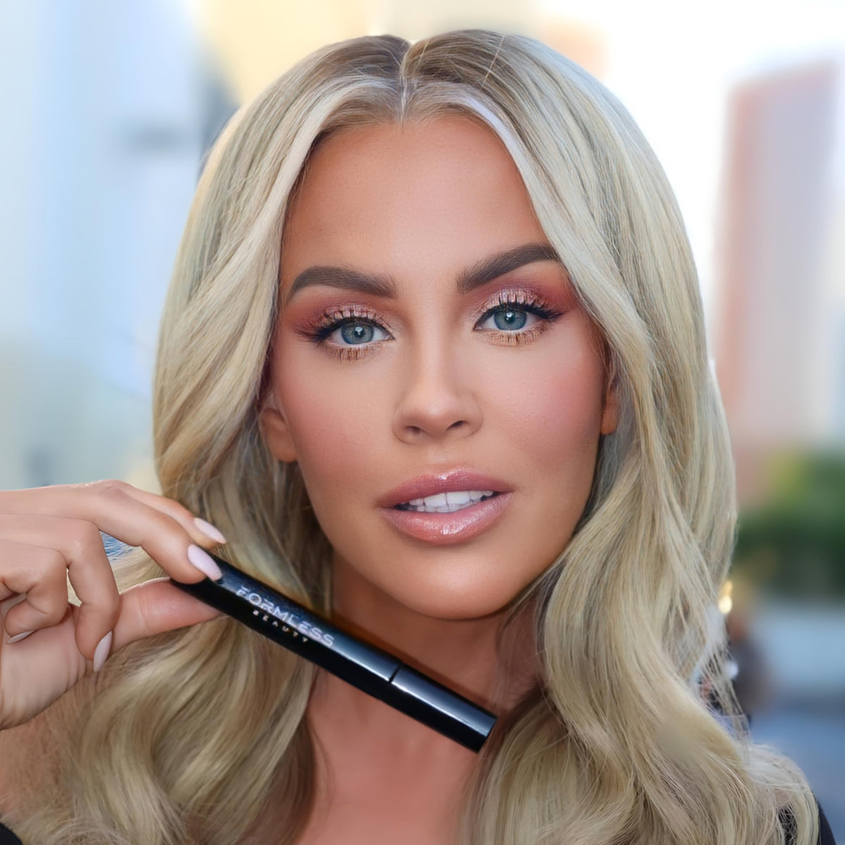 Formless Beauty mascara wand brush close-up showing bristle design for lift and separation