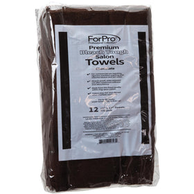 ForPro towel held beside hands to show 16x27 inch size and practical scale
