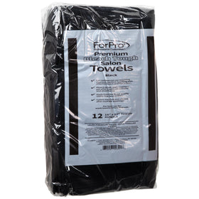 ForPro towel next to hand for size comparison showing 16x27 practicality