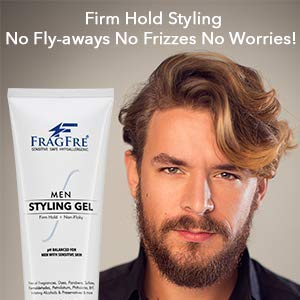 FRAGFRE man styling hair in mirror demonstrating firm shaped style