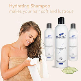 FRAGFRE bottle held in hand showing 8 oz scale and travel-friendly convenience