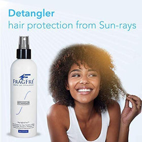 FRAGFRE in a travel pouch with other essentials, ideal for on-the-go styling protection
