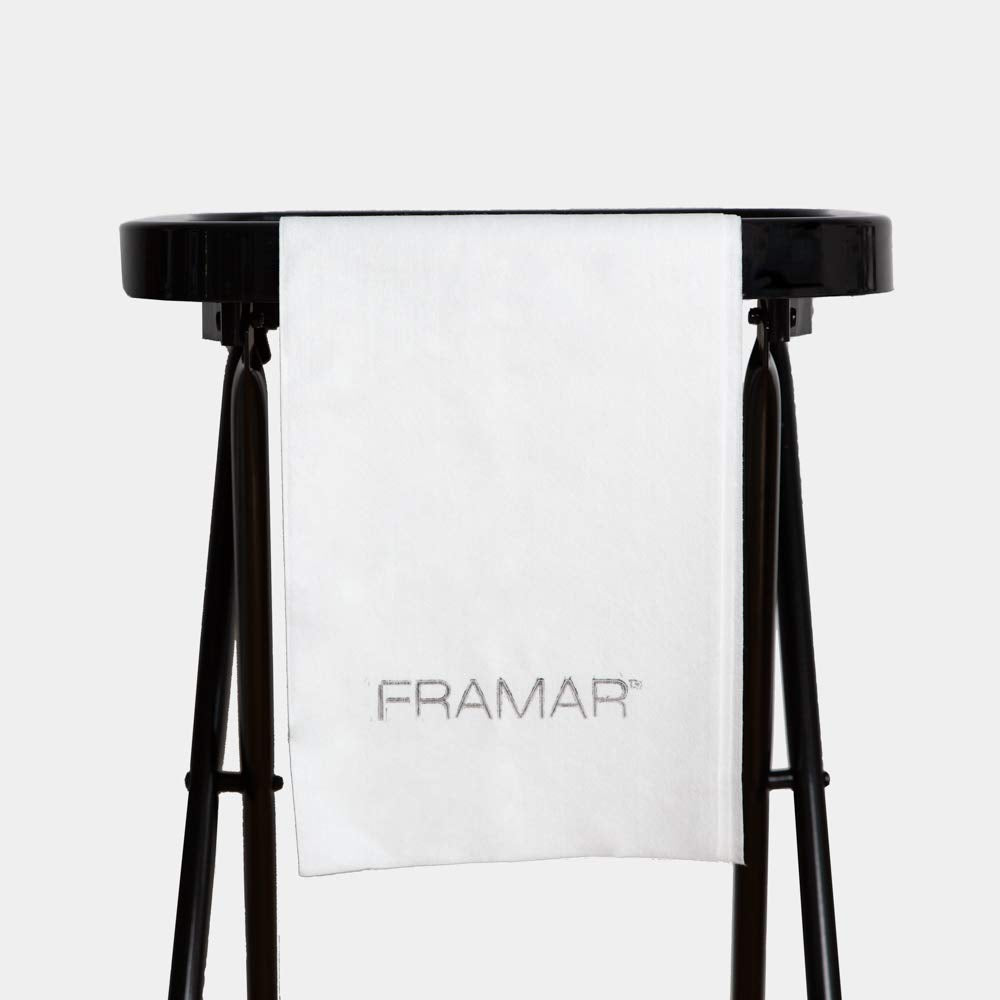 FRAMAR towel beside a ruler showing size and convenient scale