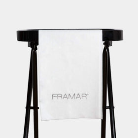 FRAMAR towel beside a ruler showing size and convenient scale