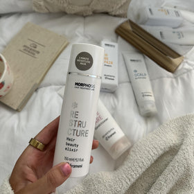 FRAMESI Morphosis applied in shower demonstrating five-minute treatment benefit
