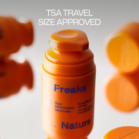 Freaks of Nature tube in hand showing travel-friendly 1.7 oz size
