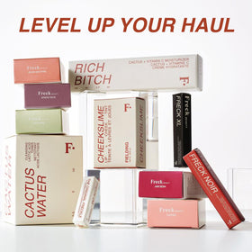 Freck Beauty Freck XL sitting inside a makeup bag ready for daily or travel use