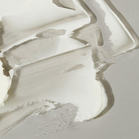Freck Beauty jar open revealing lightweight cream texture for quick absorption benefit