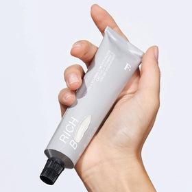 Freck Beauty jar beside ruler to show size and travel-friendly portability