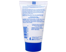 Free & Clear 2 oz bottle next to travel essentials showing TSA-friendly convenience