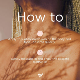massaging frei öl into arm skin showing body hydration and improved skin smoothness benefit