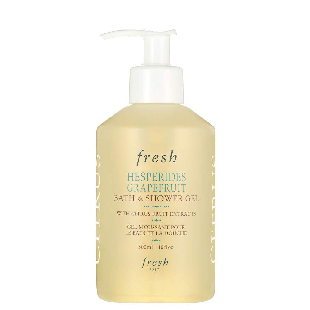 Fresh Hesperides grapefruit lather closeup on skin, moisturizing foam for refreshed skin