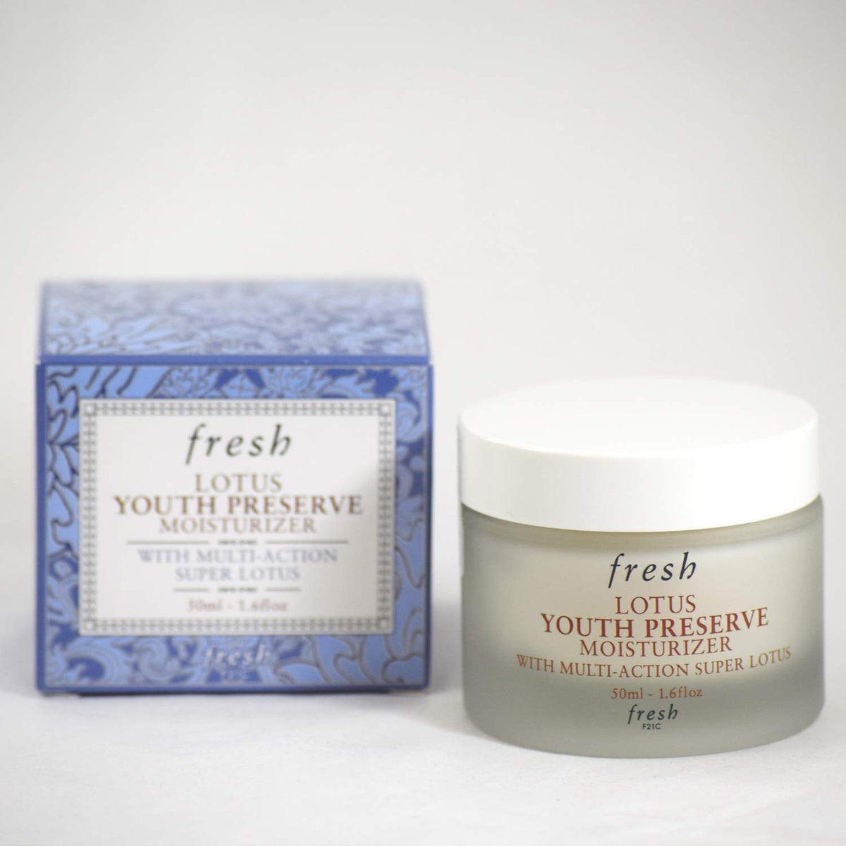 Fresh Lotus on bathroom shelf lifestyle shot conveying daily routine convenience benefit