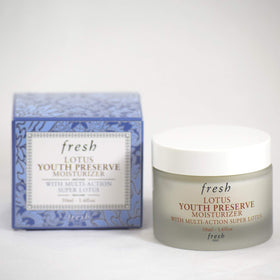 Fresh Lotus on bathroom shelf lifestyle shot conveying daily routine convenience benefit